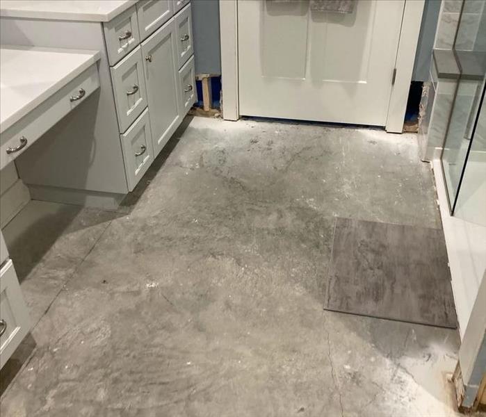 floor removed in bathroom after water damage